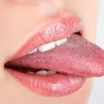 woman sticking out tongue